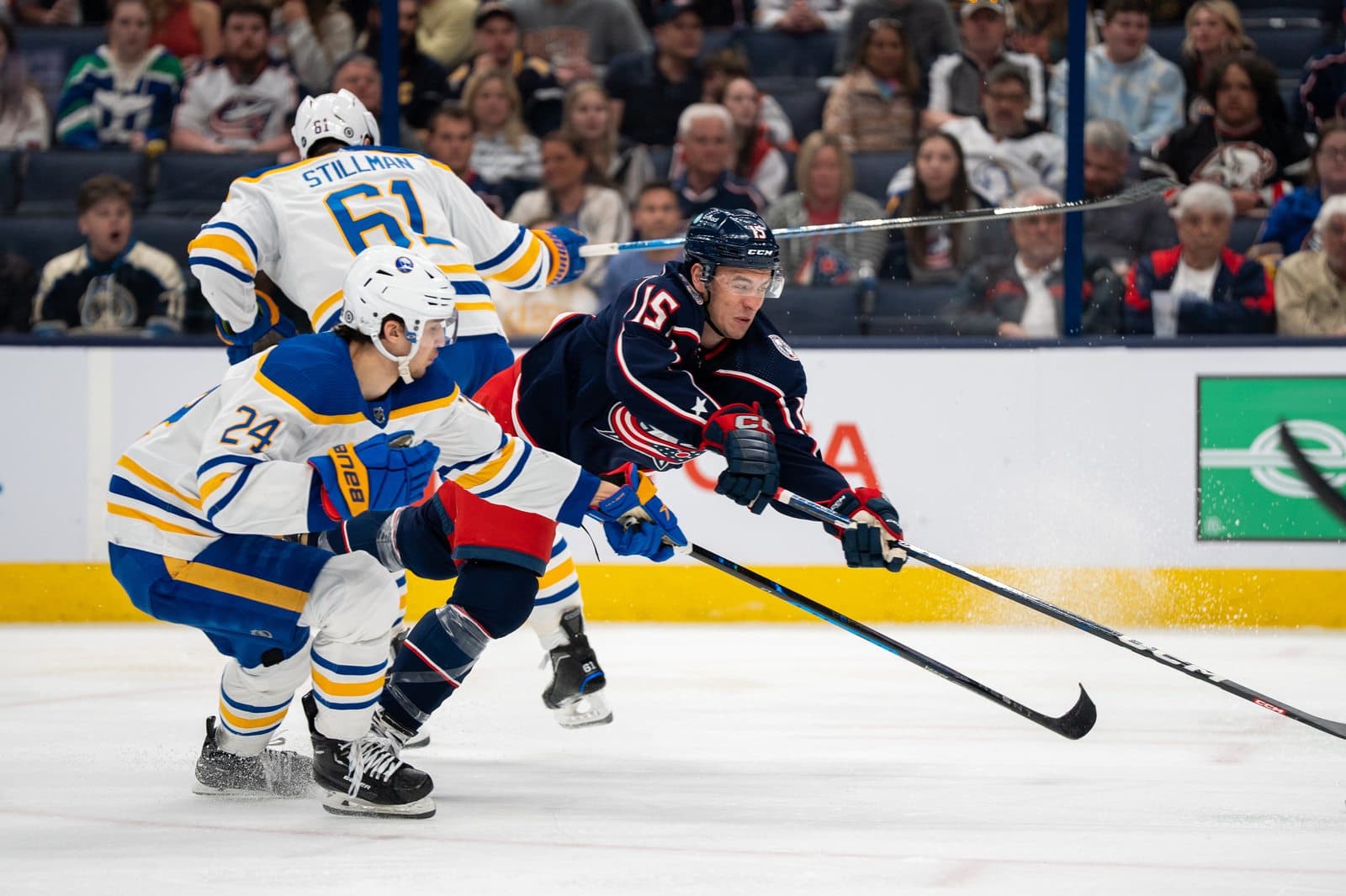 Gavin Bayreuther driving the puck up ice for the Columbus Blue Jackets